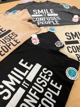 Load image into Gallery viewer, &quot;SMILE IT CONFUSES PEOPLE&quot; T-Shirt - Black
