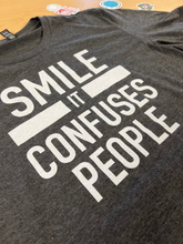 Load image into Gallery viewer, &quot;SMILE IT CONFUSES PEOPLE&quot; T-shirt - Gray
